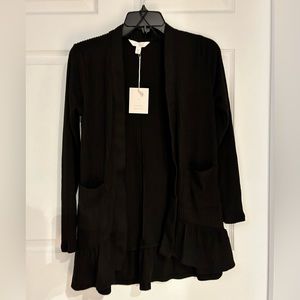 Lauren Conrad black sweater with ruffled bottom size XS.